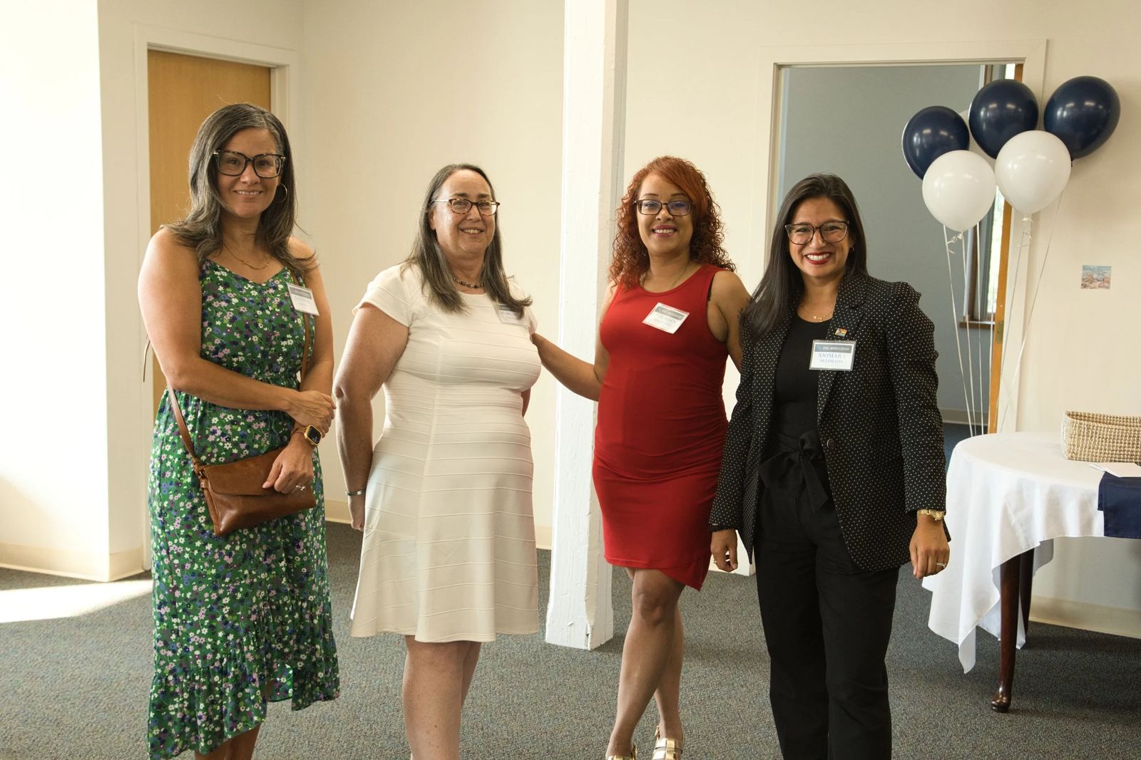 Four women at an O'Dell Women's Center gathering